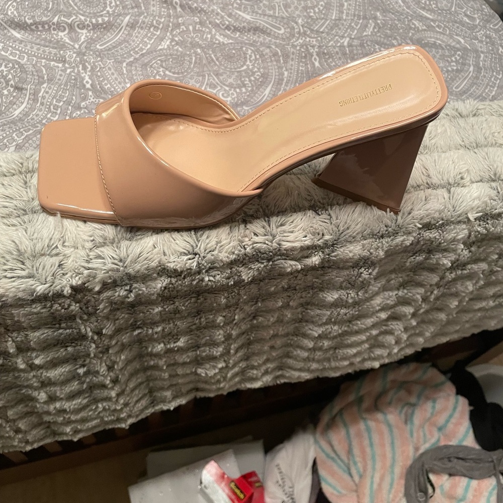Women’s size 9.5 wide, chunky heel. Imperfections on shoes. Worn once.